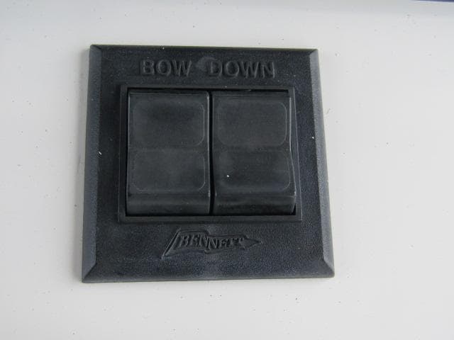 Bennett trim tab control on 1999 Boston Whaler 23 Outrage boat.