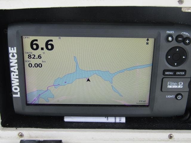Lowrance Elite-9 GPS on 1999 Boston Whaler 23 Outrage, displaying depth and water temperature.