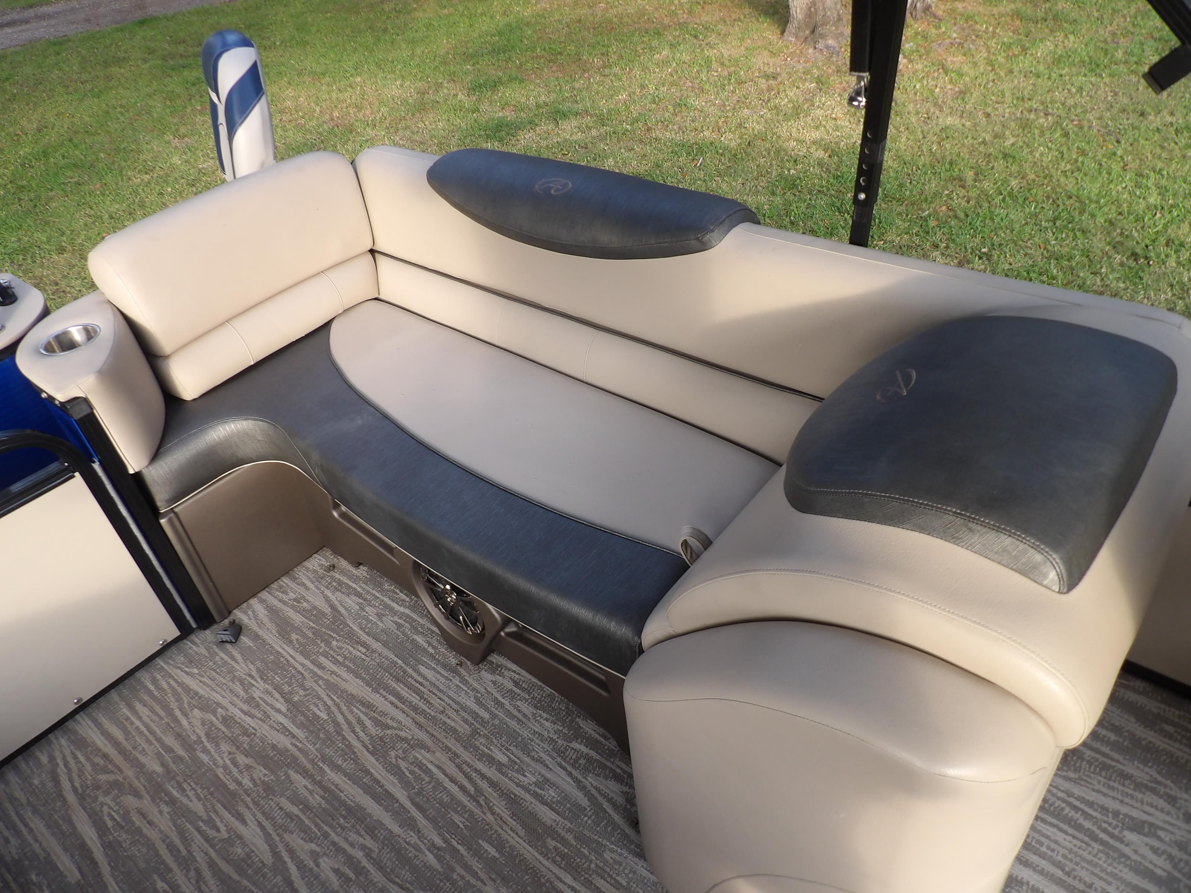 2020 Avalon 2385 Catalina QL SWS boat interior seating with beige and black upholstery.