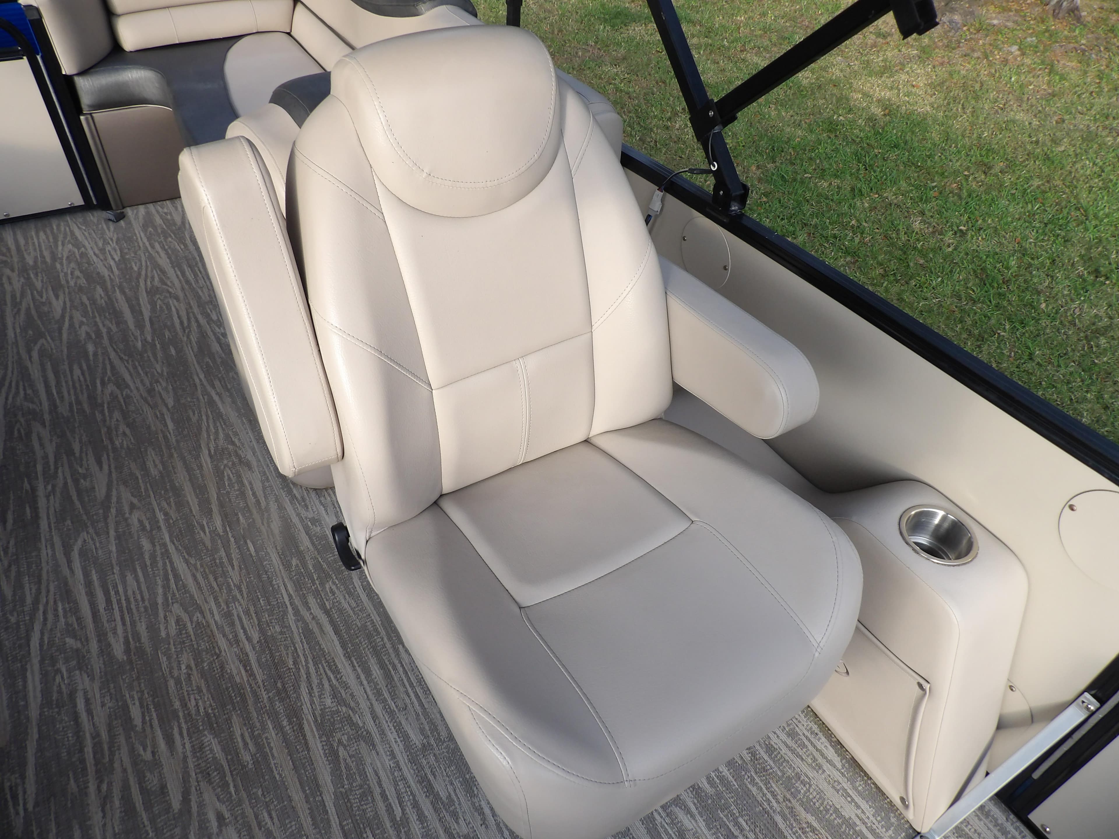 2020 Avalon 2385 Catalina QL SWS boat seat with armrests and cup holder.