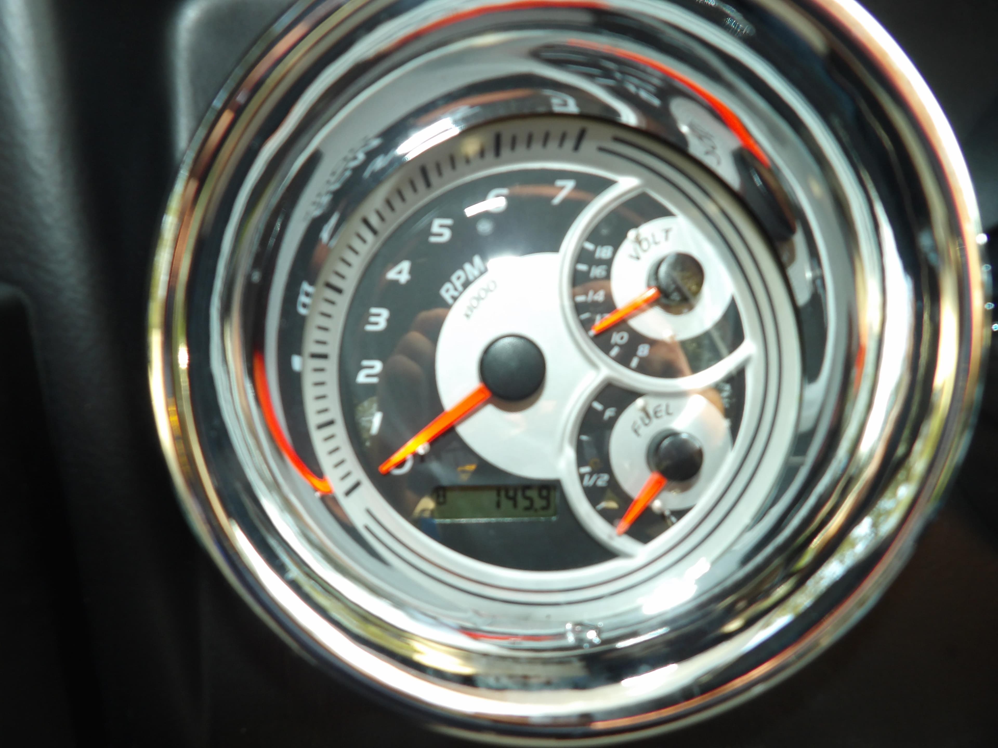 Close-up of 2020 Avalon 2385 Catalina QL SWS boat dashboard gauges.