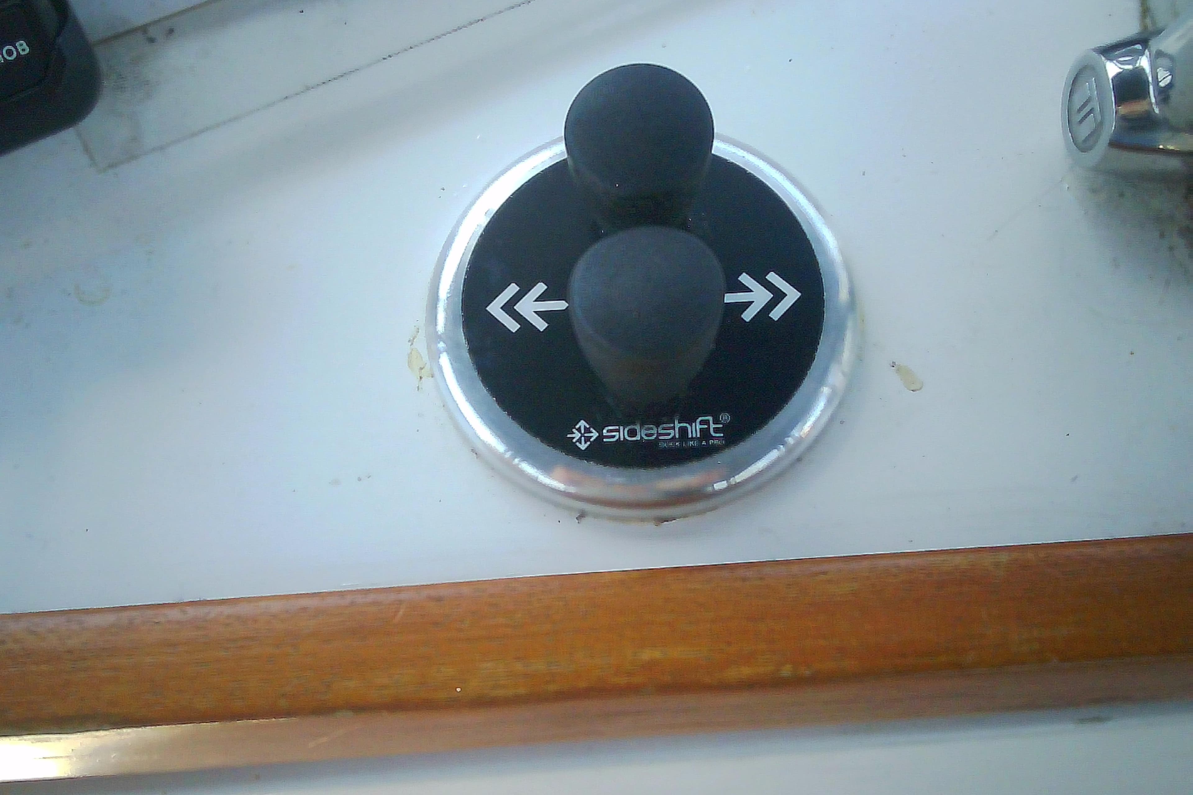 Boat control panel with Sideshift thruster knobs on a 1999 Sabre 34.