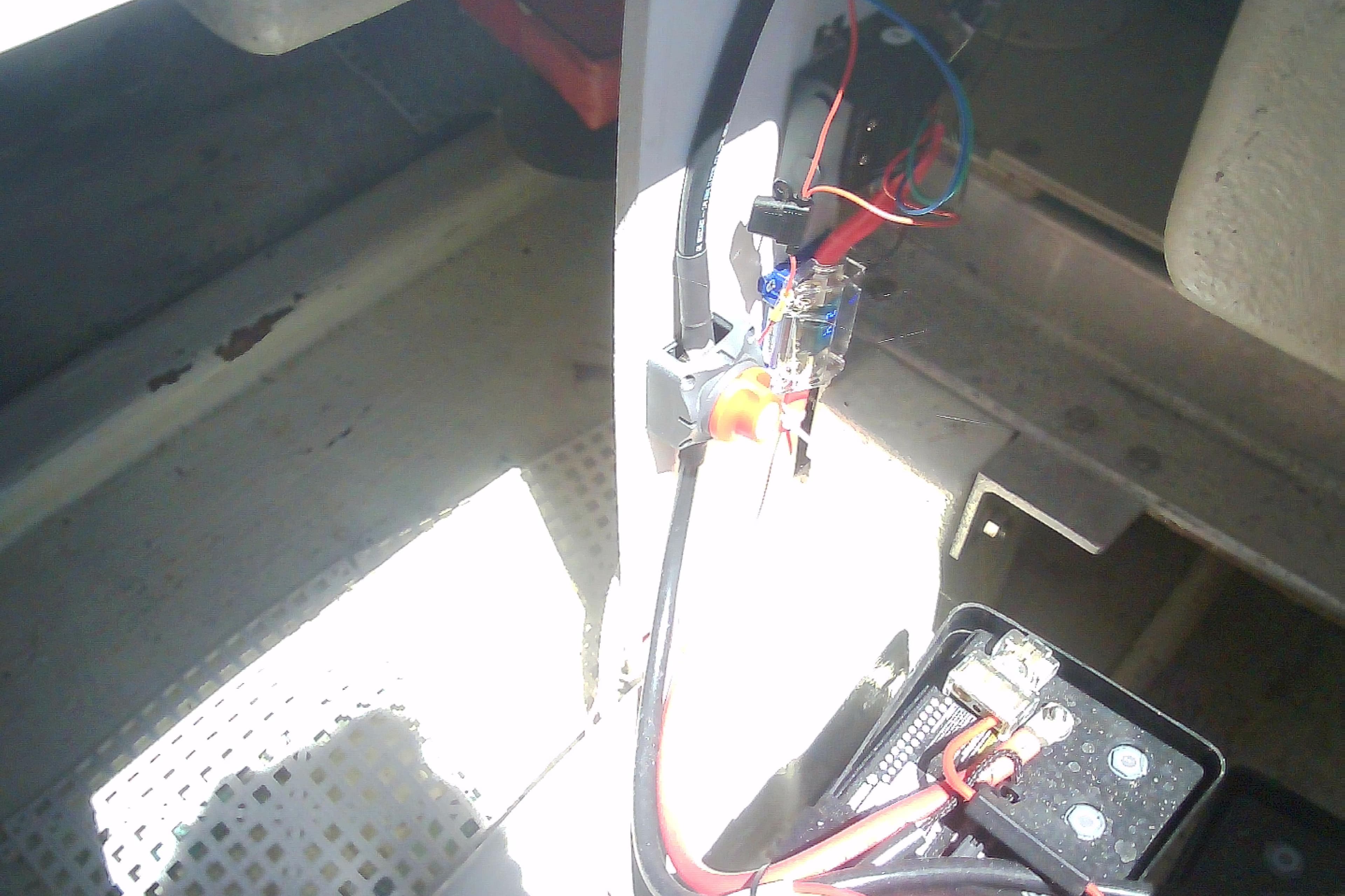 Electrical wiring setup in a 1999 Sabre 34 boat, featuring battery connections and components.
