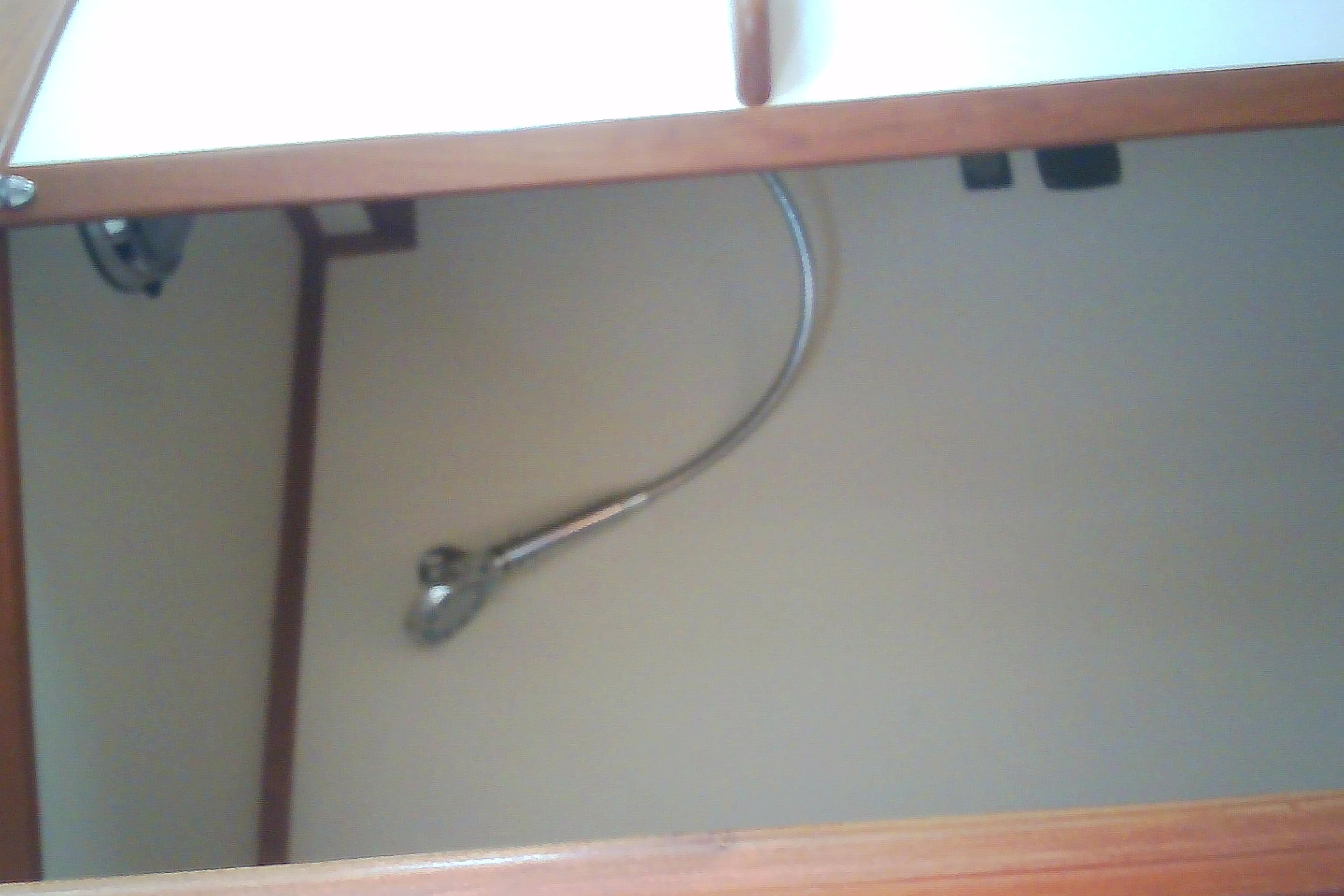 Interior view of a 1999 Sabre 34 yacht showing a showerhead fixture.