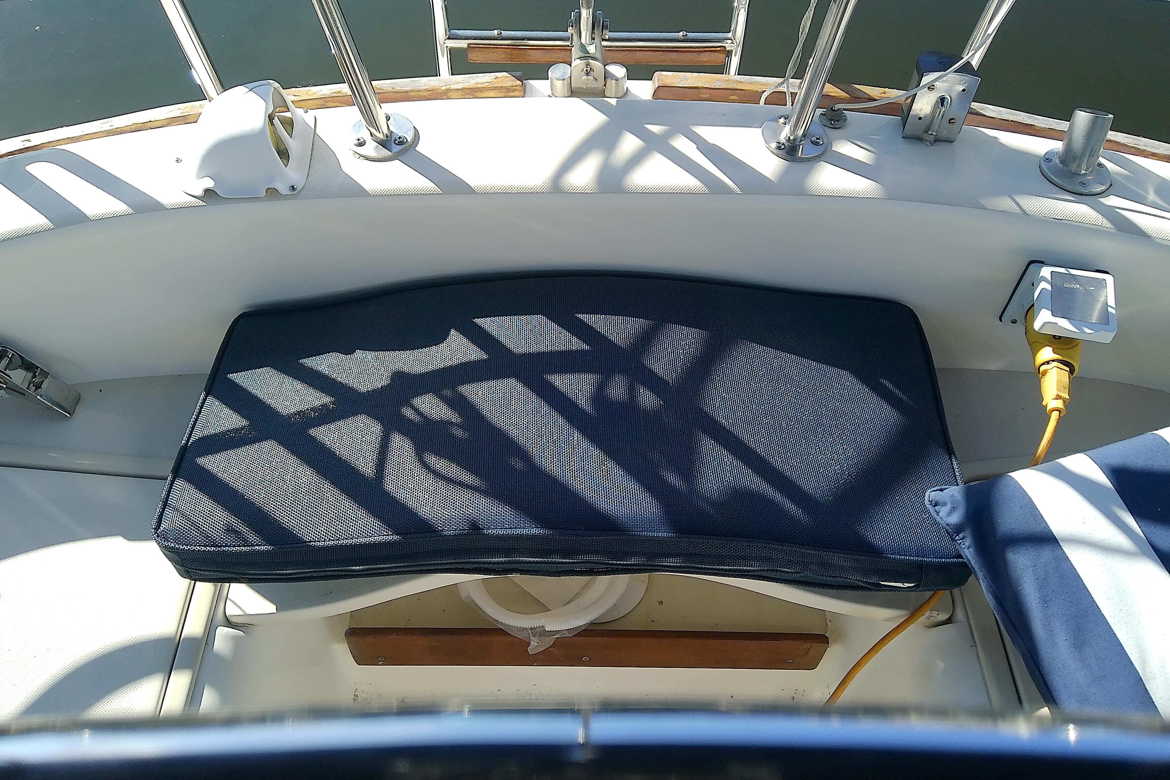 Cockpit of 1988 Pearson 36-2 sailboat with cushioned seating and nautical equipment.