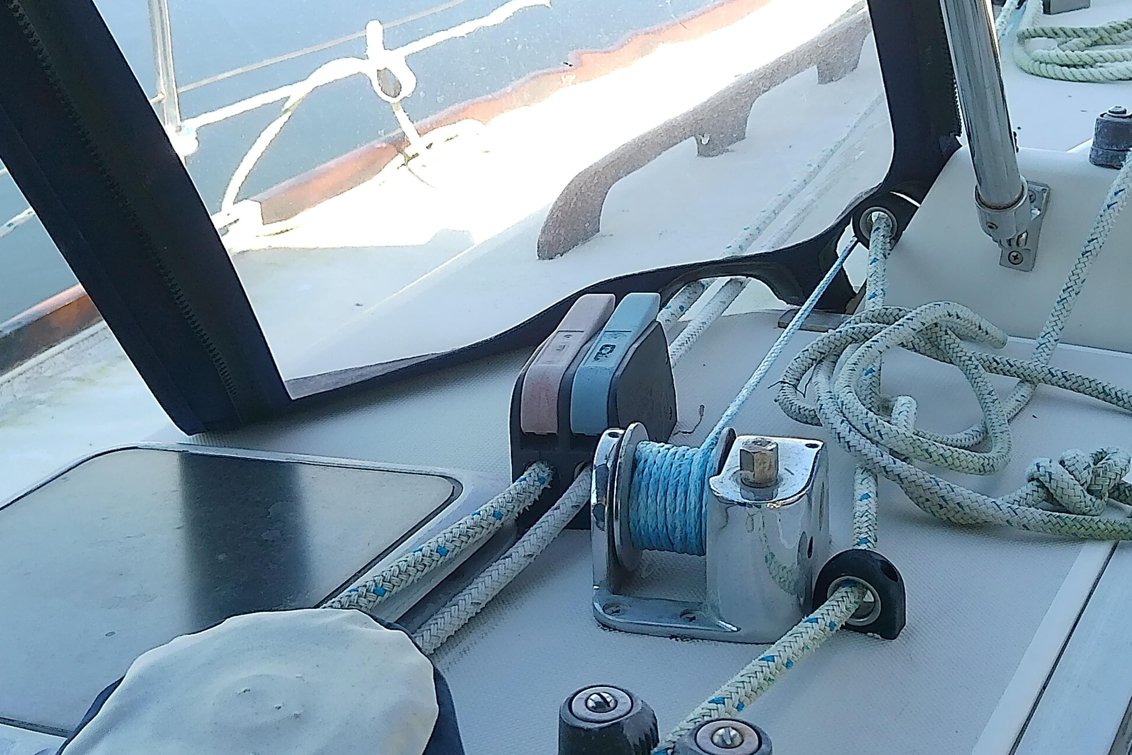 Deck of 1988 Pearson 36-2 sailboat with ropes and winch system.