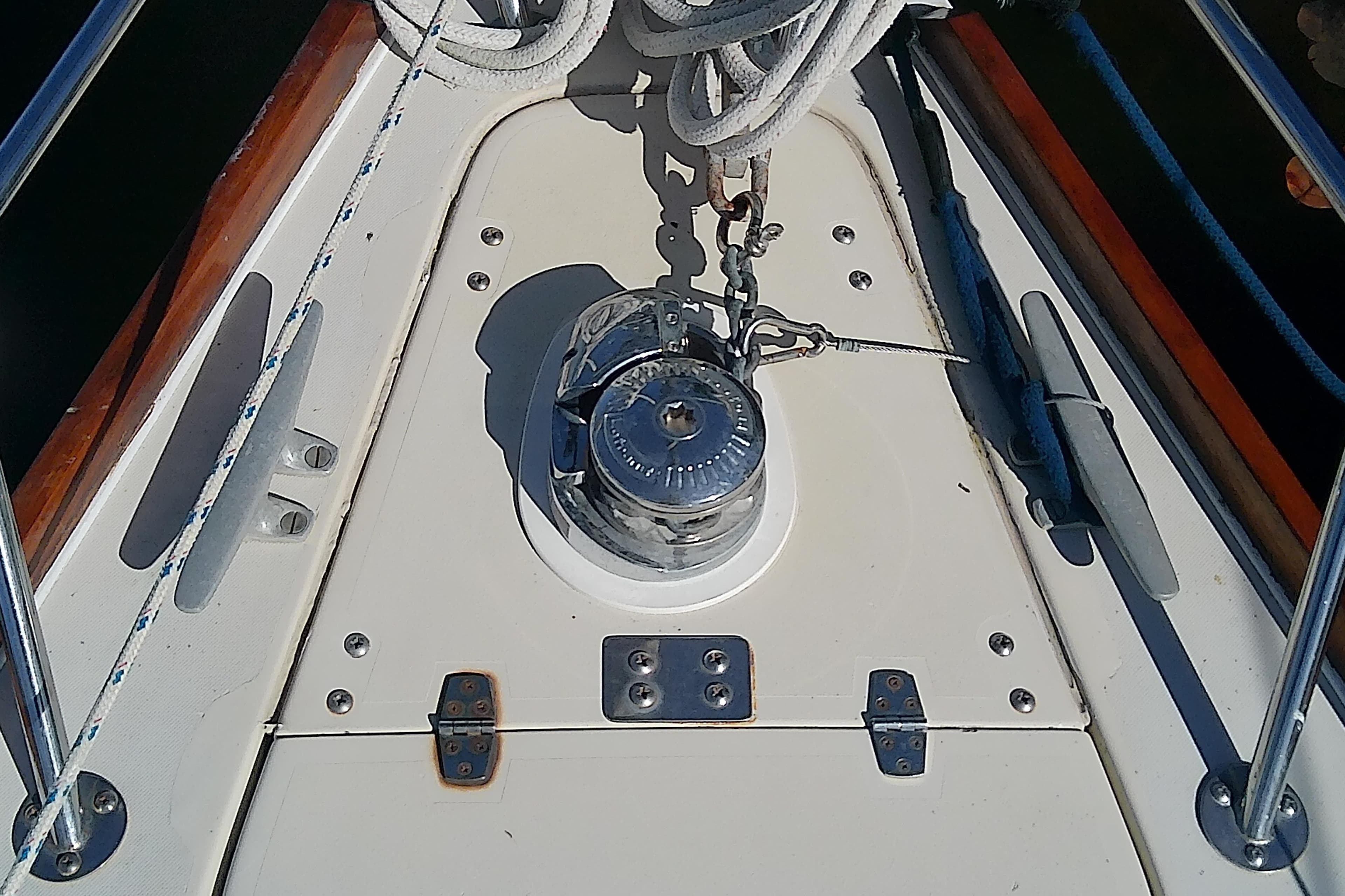 Deck of 1988 Pearson 36-2 sailboat with winch and ropes.