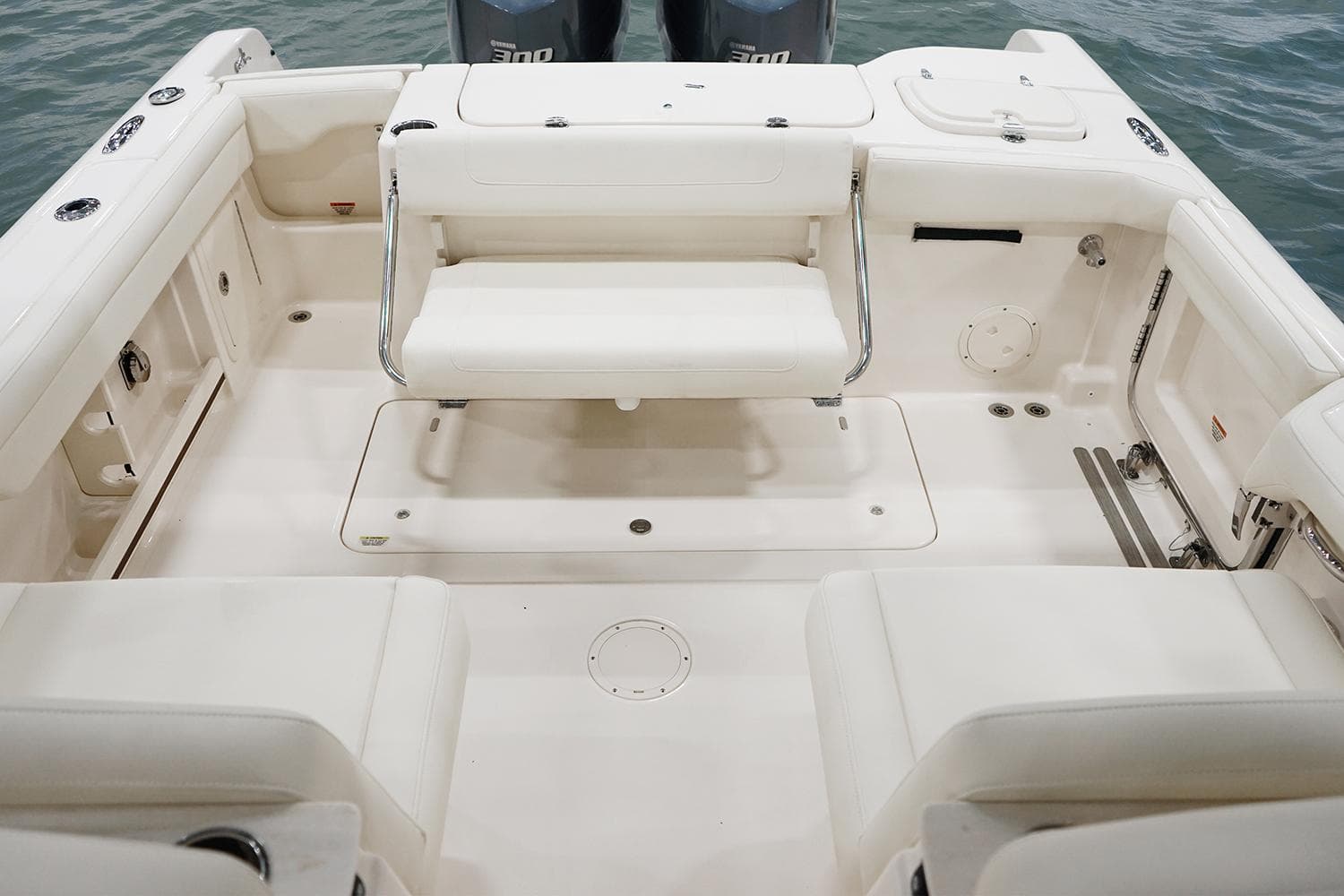 Manufacturer Provided Image: 2023 Grady-White Freedom 285 boat interior with seating and storage compartments.