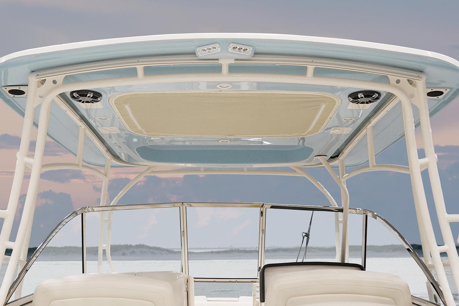 Manufacturer Provided Image: 2023 Grady-White Freedom 285 boat with a sleek hardtop and scenic background.