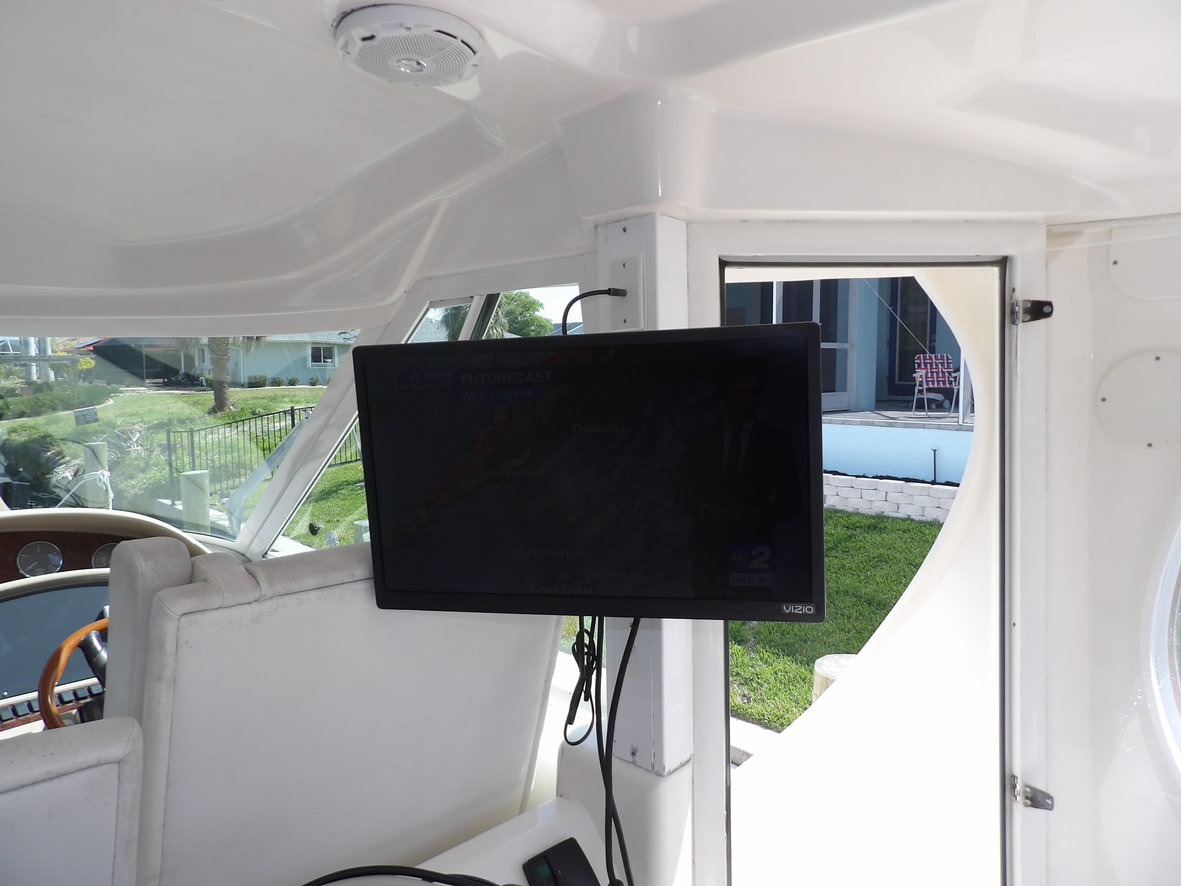 Flat-screen TV in the cabin of a 2003 Sea Ray 390 Motor Yacht.