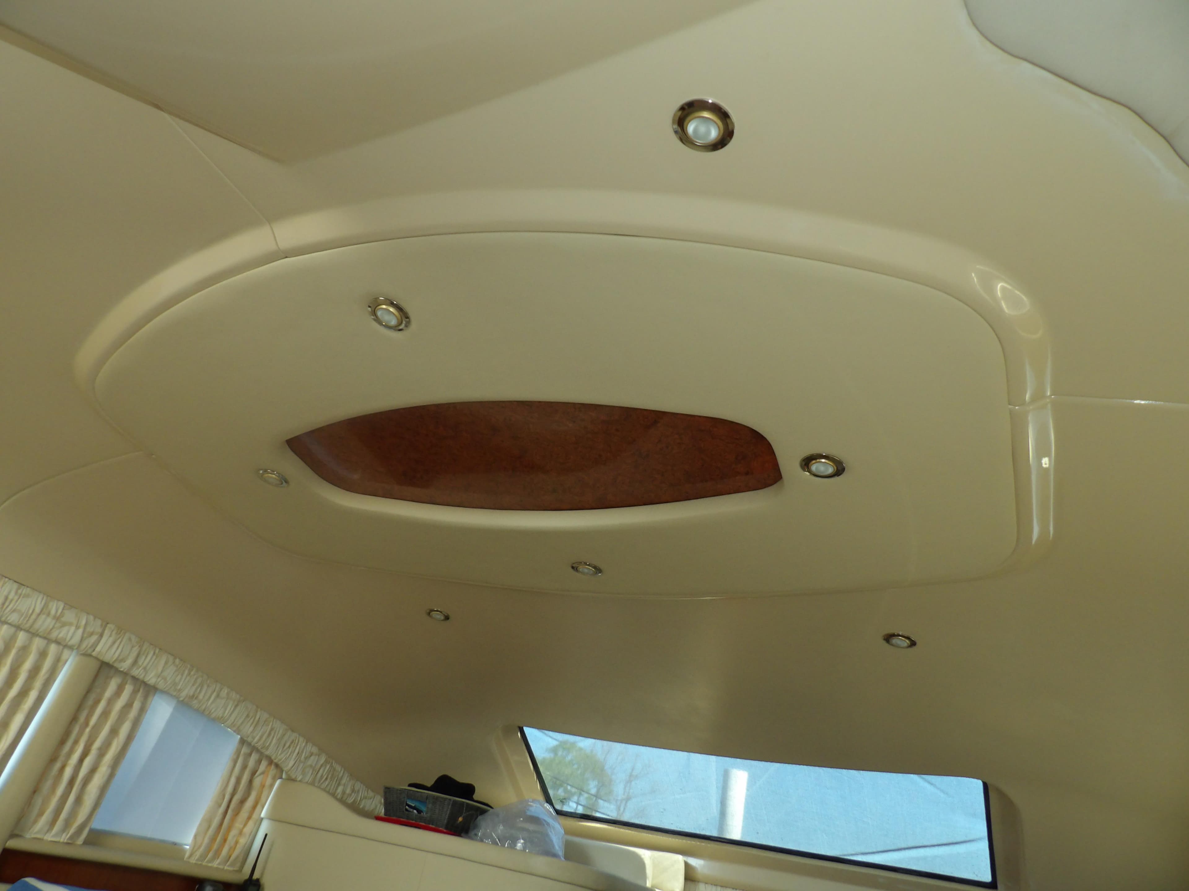 Ceiling interior of 2003 Sea Ray 390 Motor Yacht with recessed lighting.