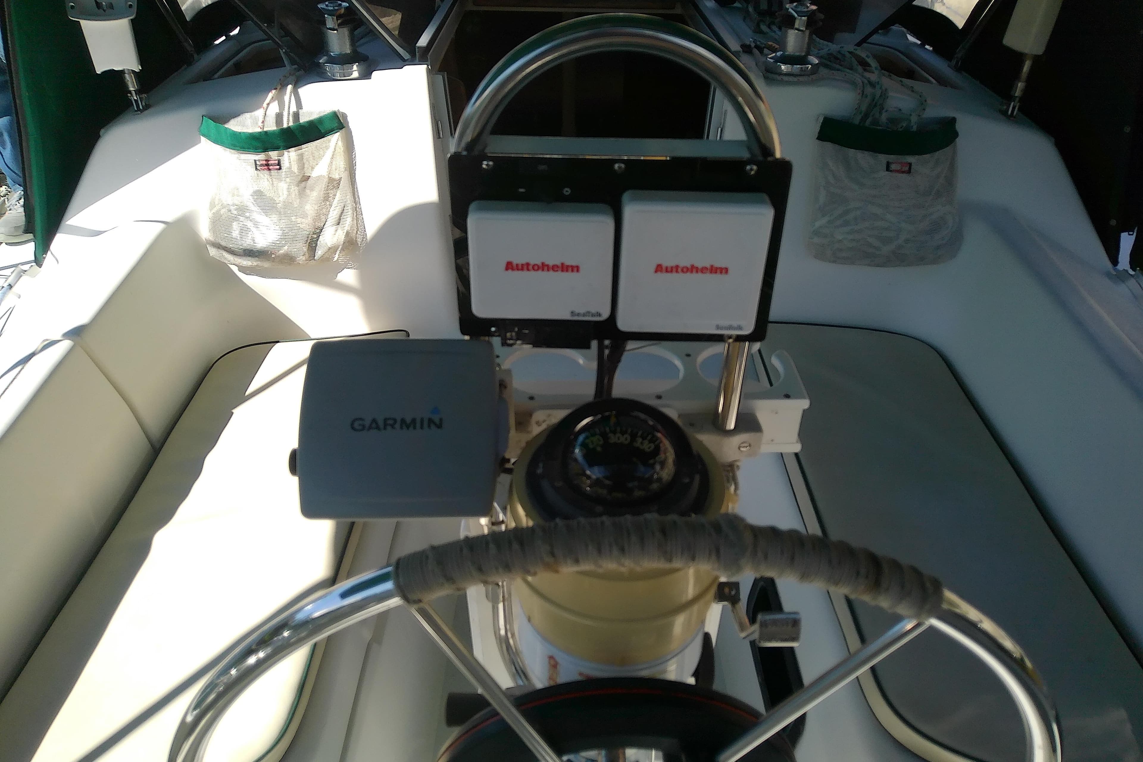 Cockpit of 1991 Hunter 30 sailboat with Garmin and Autohelm equipment.
